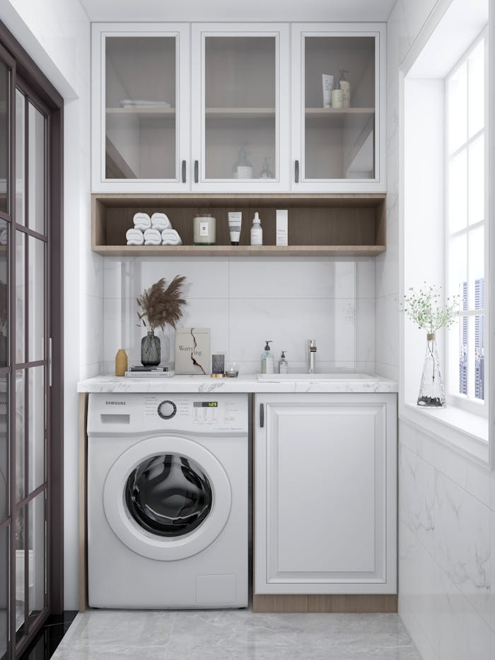 Crafting Captivating Headlines: Your awesome post title goes here A sleek and bright laundry room featuring a washing machine, cabinets, and natural decor.